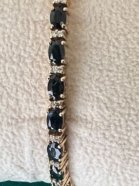 14k Sapphire bracelet with diamond .